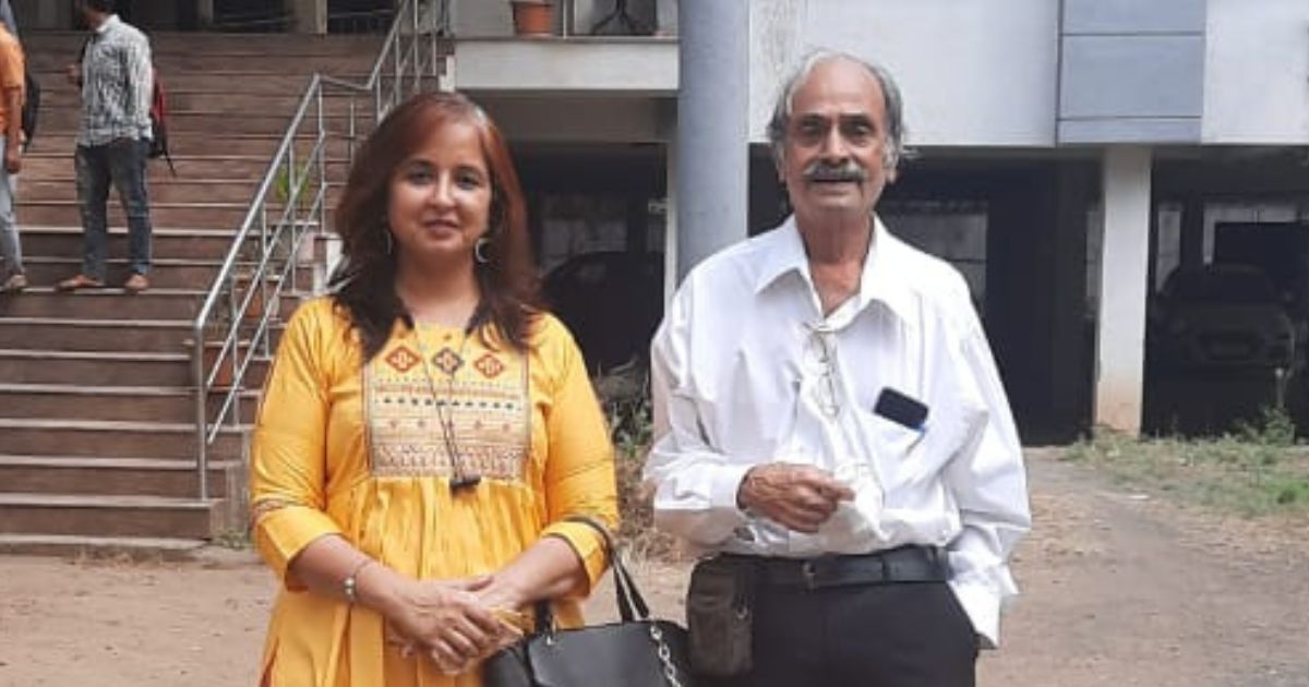 Dipali Akolkar Founder of FunSmartism is standing with Pramod Khandekar Sr. Scientist from NII in front of a building